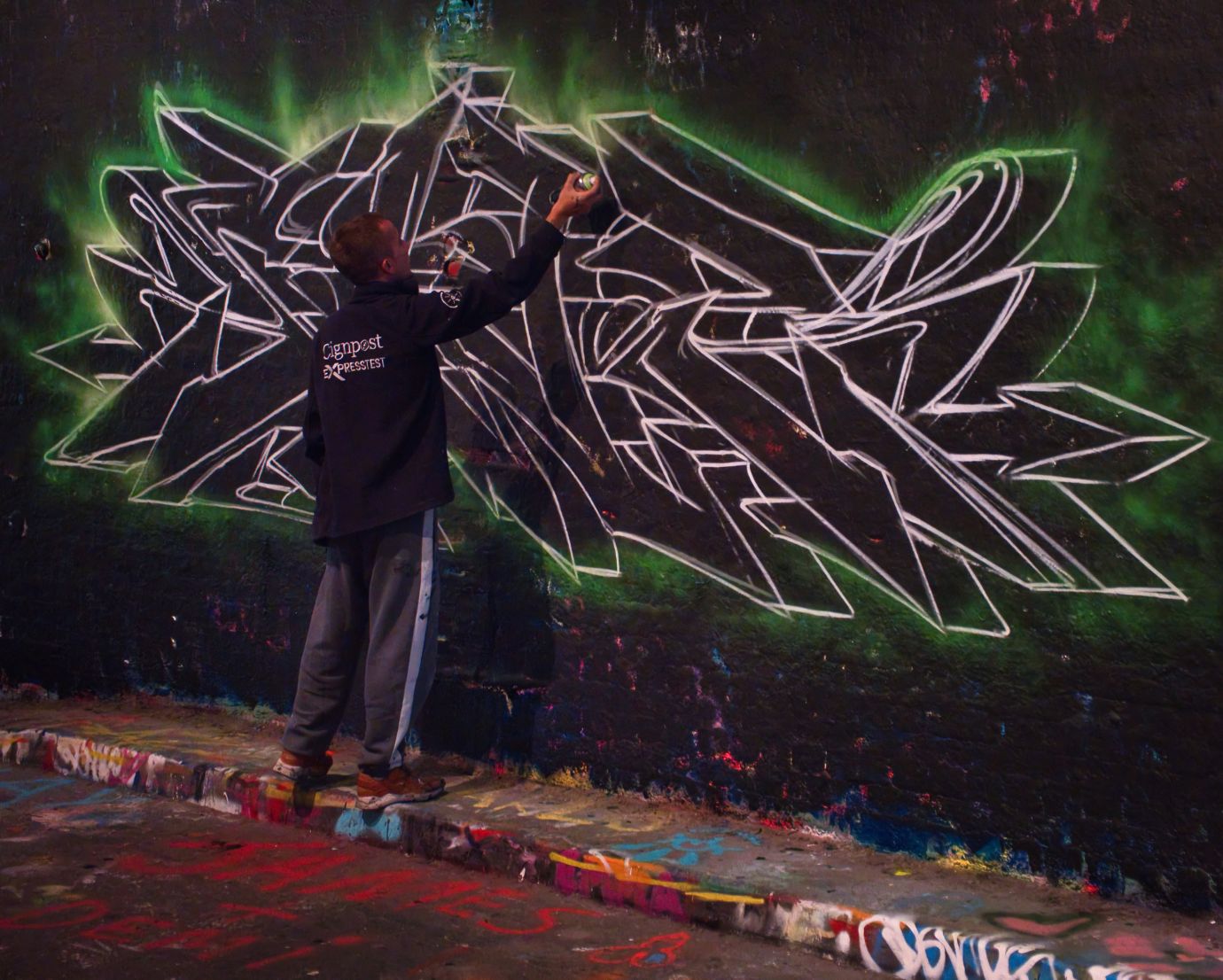 Graffiti-artist-Leake-Street-Vaults-London-Waterloo-F5129-08072025